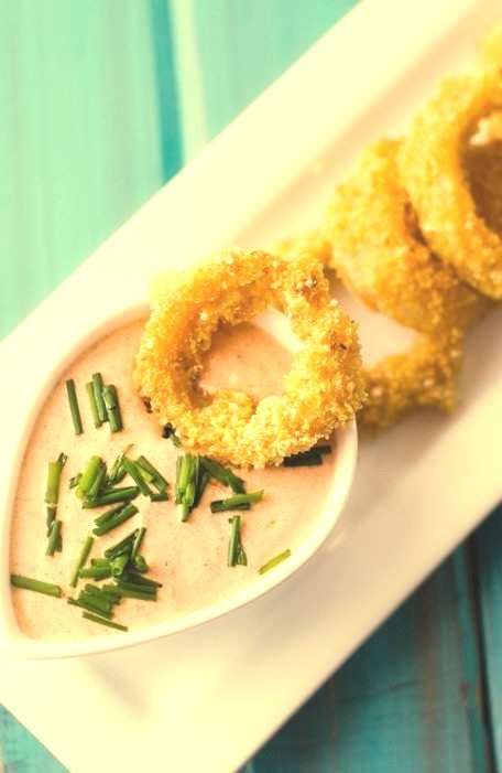Quinoa Crusted Baked Onion Rings with Spicy Dipping Sauce